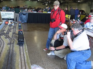 I traded one of my steel boxcar models for a Rich Yoder brass hopper and brought it back to the "alcove" at the show.  (L-R:  Bob McCown, Ric Golding, Jon Radder)