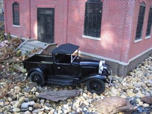 A new Ford pickup.  (A metal model)