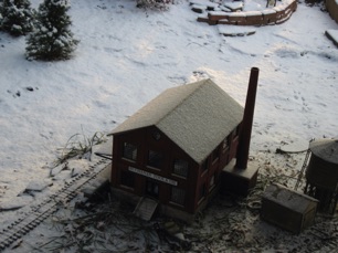 January 12.   A bit of light snow on Buchanan Tool & Die.