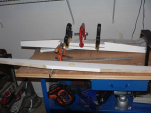 October 5, 2006.  I settled on a 3 foot diameter turntable. Using 1x3 TUF board (a composite plastic), I cut two long side pieces and two shorter ones for top and bottom; then tapered the two side pieces. 