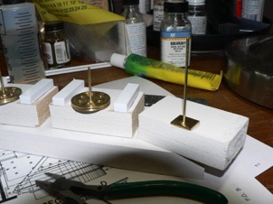 October 6, 2006. My idea was to make this a continuous 3 point balance turntable, with wheels on each end contacting the rail. I used some brass pulleys from my scrap box along with a brass rod for an axle. These were sandwiched between two spacer blocks. October 6, 2006. My idea was to make this a continuous 3 point balance turntable, with wheels on each end contacting the rail. I used some brass pulleys from my scrap box along with a brass rod for an axle. These were sandwiched between two spacer blocks.