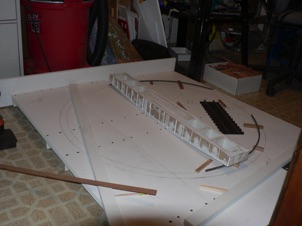 October 11, 2006. I made a base from wider strips of TUF board, reinforced with strips underneath. I glued everything and then used deck screws to clamp it in place. October 11, 2006. I made a base from wider strips of TUF board, reinforced with strips underneath. I glued everything and then used deck screws to clamp it in place.