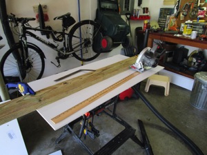 I clamp the 2x6 to the PVC to make a guide for the saw and pretty soon I have 4 pieces ready to go.

Eventually, I'd like to use my 2X8 pieces for the curved section to simulate a ballasted through-type plate girder bridge.