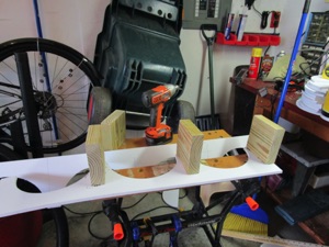 Once everything is cut, it's time for the "feet". These will be spacers that the 2x6 will rest on. They are glued and screwed in place. (Although here they are just sitting around waiting for something to happen.)
