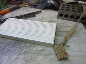 But, I have a 6mm piece of homasote. I'll just carve it to look like a fire hose; this should look pretty good.