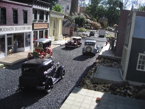 A street full of Hubley kits.  (These 4 are all 1:20 scale.)
