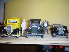 Left to right - A 1:19 Ford Pickup, a 1:20 person, a 1:20 Ford, a 1:22.5 person, and a 1:24 vehicle.